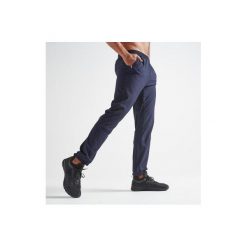 Spodnie fitness kardio męskie FPA 500 granatowe. Niebieskie spodnie męskie DOMYOS, xl, bez wzorów, z elastanu, sportowe. Za 79,99 zł.