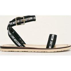 Love Moschino - Sandały. Czarne klapki damskie Love Moschino, bez wzorów, ze skóry, bez obcasa, na obcasie. W wyprzedaży za 449,90 zł.