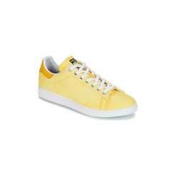 Buty adidas STAN SMITH PW HU HOLI. Żółte trampki męskie Adidas, bez wzorów, bez zapięcia. Za 300,30 zł.