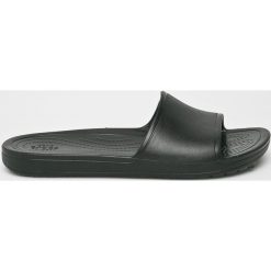 Crocs - Klapki. Niebieskie klapki damskie Crocs, bez wzorów, z gumy, bez obcasa, na obcasie. Za 89,90 zł.