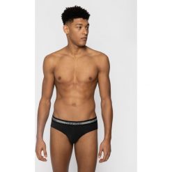 Komplet 3 par slipów Calvin Klein Underwear 000NB2142A. Czarne slipy męskie Calvin Klein Underwear, s, bez wzorów, z elastanu. W wyprzedaży za 149,00 zł.