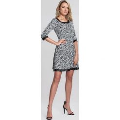 Czarna Sukienka Single File. Czarne sukienki damskie other, xl, bez wzorów, bez kołnierzyka, bez rękawów, mini. Za 39,99 zł.