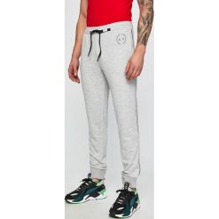 Armani Exchange - Spodnie. Niebieskie spodnie męskie marki Armani Exchange, na co dzień, m, bez wzorów, z elastanu, casualowe. Za 449,90 zł.