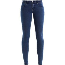 Dr.Denim DIXY Jeans Skinny Fit pure dark blue. Niebieskie rurki damskie marki Dr.Denim, z elastanu. Za 249,00 zł.