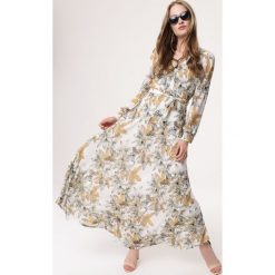 Biała Sukienka Dance Music. Białe sukienki damskie Born2be, na lato, s, bez wzorów, z tkaniny, bez kołnierzyka, bez rękawów, maxi. Za 129,99 zł.