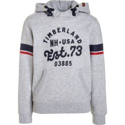 Timberland Bluza z kapturem meliertes grau. Szare bluzy męskie z kapturem marki Timberland, z bawełny. W wyprzedaży za 215,20 zł.