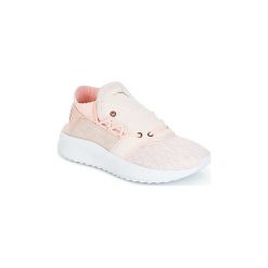 Buty Puma Tsugi SHINSEI WN S. Różowe trampki i tenisówki damskie marki Puma, bez wzorów, bez zapięcia. Za 423,20 zł.