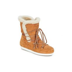 Śniegowce Moon Boot FAR SIDE HIGH SHEARLING. Pomarańczowe kozaki damskie marki Moon Boot, bez zapięcia. Za 1023,20 zł.