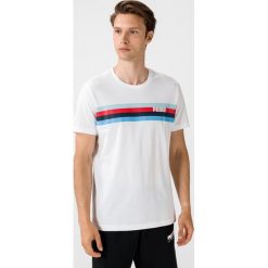 Puma Celebration Koszulka Biały. Białe podkoszulki męskie Puma, xl, z nadrukiem, z bawełny, z krótkim rękawem. Za 102,95 zł.