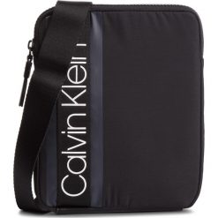 Saszetka CALVIN KLEIN - Clash Flat Crossover K50K504194 001. Czarne torby męskie skórzane Calvin Klein, bez wzorów, ze skóry ekologicznej, młodzieżowe. W wyprzedaży za 229,00 zł.