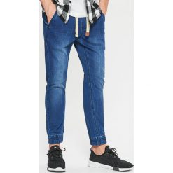 Jeansy SLIM JOGGER - Granatowy. Niebieskie jeansy męskie slim Cropp. Za 129,99 zł.