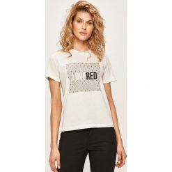 Red Valentino - T-shirt. Białe bluzki damskie Red Valentino, s, z nadrukiem, z bawełny, z okrągłym kołnierzem, z krótkim rękawem. Za 399,90 zł.