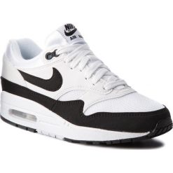 Buty NIKE - Air Max 1 319986 109 White/Black. Białe buty sportowe damskie Nike, bez wzorów, z tworzywa sztucznego, bez obcasa, na płaskiej podeszwie, bez zapięcia. W wyprzedaży za 459,00 zł.
