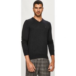 Tommy Hilfiger - Sweter. Czarne swetry męskie TOMMY HILFIGER, s, z aplikacjami, z bawełny, bez kołnierzyka, bez kaptura. W wyprzedaży za 379,90 zł.