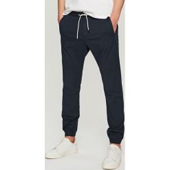 Joggery mÄ™skie: Joggery slim fit – Granatowy