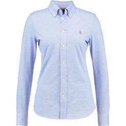 Polo Ralph Lauren HEIDI Koszula harbor island blue. Szare koszulki polo damskie marki U.S. Polo, s, z bawełny, casualowe, z klasycznym kołnierzykiem, z długim rękawem. Za 519,00 zł.