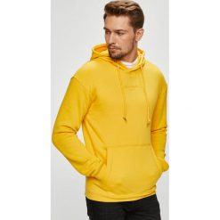Jack & Jones - Bluza. Pomarańczowe bejsbolówki męskie Jack & Jones, l, z bawełny, z kapturem. W wyprzedaży za 119,90 zł.