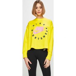 Nike Sportswear - Bluza. Żółte bluzy damskie Nike Sportswear, s, z nadrukiem, z bawełny, bez rękawów, bez kaptura. W wyprzedaży za 239,90 zł.