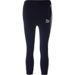 Puma CLASSIC TRACK PANTS Spodnie treningowe peacoat. Niebieskie spodnie chłopięce Puma, z bawełny. Za 149,00 zł.