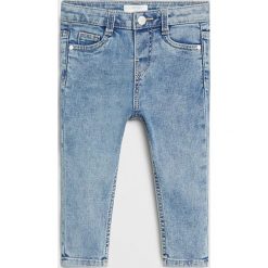 Mango Kids - Jeansy dziecięce Elena 80-104 cm. Niebieskie jeansy dziewczęce Mango Kids, bez wzorów, z elastanu. Za 59,99 zł.