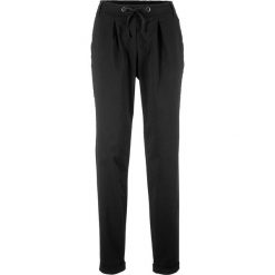 Spodnie chino z wpuszczanymi kieszeniami bonprix czarny. Spodnie damskie bonprix. Za 109,99 zł.