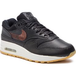 Buty NIKE - Air Max 1 Prm 454746 020 Black/Black/Gum Yellow. Czarne buty sportowe damskie Nike, na co dzień, bez wzorów, ze skóry ekologicznej, bez obcasa, bez zapięcia. W wyprzedaży za 499,00 zł.