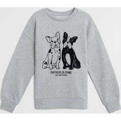 Mango Kids - Bluza dziecięca Dubliny 110-164 cm. Szare bluzy dziewczęce Mango Kids, z nadrukiem, z bawełny, bez rękawów, bez kaptura. Za 59,99 zł.