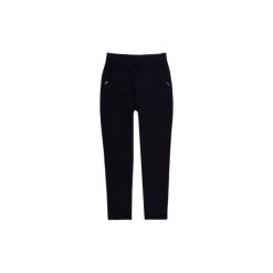 Spodnie damskie legginsy gładkie. Czarne legginsy TXM. Za 24,99 zł.