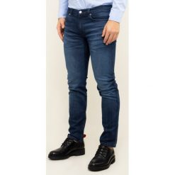 Jeansy Slim Fit Hugo 708 50419635. Niebieskie jeansy męskie HUGO, m, bez wzorów, z elastanu. W wyprzedaży za 359,00 zł.