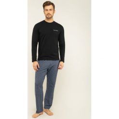 Piżama Calvin Klein Underwear 000NM1600E. Niebieskie piżamy męskie Calvin Klein Underwear, xl, bez wzorów, z elastanu, bez rękawów. W wyprzedaży za 299,00 zł.