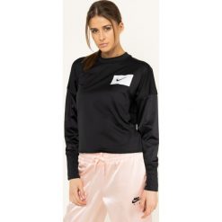 Koszulka techniczna NIKE Crew Rebel BV7733. Czarne koszulki damskie polo Nike, m, bez wzorów, z elastanu, bez rękawów. W wyprzedaży za 139,00 zł.