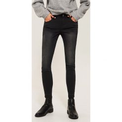Jeansy skinny - Czarny. Czarne boyfriendy damskie House. Za 99,99 zł.