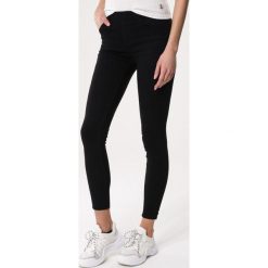 Czarne Legginsy Brilliancy. Czarne legginsy damskie Born2be, s, bez wzorów. Za 49,99 zł.