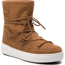 Śniegowce MOON BOOT - Pulse Mid 24101700004 Whisky. Pomarańczowe kozaki damskie Moon Boot, na zimę, ze skóry, bez obcasa, bez zapięcia. W wyprzedaży za 529,00 zł.