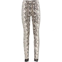 Legginsy w animalistyczny deseń, z koronką bonprix beżowy we wzór skóry węża. Brązowe legginsy damskie bonprix, w paski, ze skóry. Za 32,99 zł.
