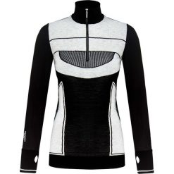 T-shirt ADIDAS BY STELLA McCARTNEY. Różowe topy damskie adidas by Stella McCartney, z nadrukiem, z wełny, z golfem. W wyprzedaży za 424,00 zł.