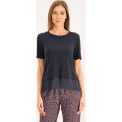 Bluzka DKNY P9GH7C93. Niebieskie bluzki damskie DKNY, xs, bez wzorów, z elastanu, bez kołnierzyka, bez rękawów. W wyprzedaży za 139,00 zł.