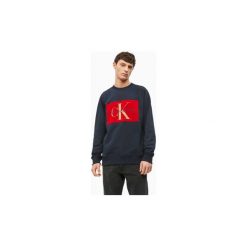 Bluzy Calvin Klein Jeans J30J313567 FLOCK MONOGRAM. Niebieskie bluzy męskie Calvin Klein Jeans, s, bez wzorów, z jeansu, bez kołnierzyka, bez rękawów, bez kaptura. Za 337,30 zł.