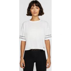 Nike Top Biały. Białe topy damskie Nike, xl, bez wzorów, z bawełny, bez kołnierzyka. Za 154,95 zł.