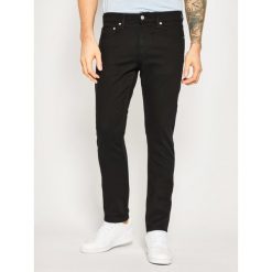 Jeansy Slim Fit Calvin Klein Jeans J30J307718911. Czarne jeansy męskie Calvin Klein Jeans, m, bez wzorów, z elastanu. W wyprzedaży za 399,00 zł.