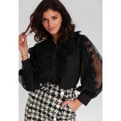 Czarna Koszula Ellouise. Czarne bluzki damskie Renee, s, bez wzorów, z jeansu, eleganckie, z klasycznym kołnierzykiem, z długim rękawem. Za 129,99 zł.