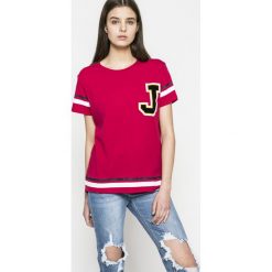 Tommy Jeans - Top. Czerwone topy damskie marki Tommy Jeans, s, z nadrukiem, z bawełny, z okrągłym kołnierzem. W wyprzedaży za 129,90 zł.