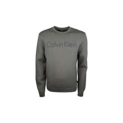 Bluzy Calvin Klein Jeans K10K100724 / Kaller LW Bonded. Zielone bluzy męskie Calvin Klein Jeans, m, bez wzorów, z jeansu, bez kołnierzyka, bez rękawów, bez kaptura. Za 299,00 zł.