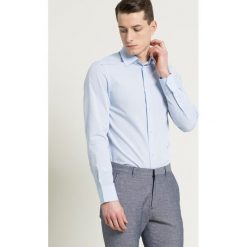 Trussardi - Koszula. Niebieskie koszule męskie marki Trussardi, bez wzorów, z bawełny, klasyczne, z włoskim kołnierzykiem, z długim rękawem. W wyprzedaży za 329,90 zł.