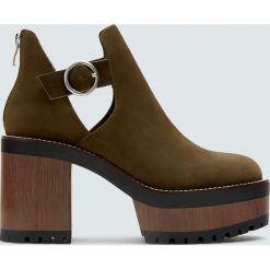 Zielone botki na obcasie i grubej podeszwie. Zielone botki damskie na obcasie marki Pull&Bear. Za 199,00 zł.