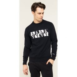 Bluza Calvin Klein Jeans Mirrored Monogram J30J314125. Czarne bluzy męskie Calvin Klein Jeans, xl, bez wzorów, z jeansu, bez kołnierzyka, bez rękawów, bez kaptura. W wyprzedaży za 269,00 zł.