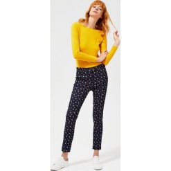 Spodnie z nadrukiem. Niebieskie spodnie damskie Moodo, xl, z elastanu. Za 39,99 zł.