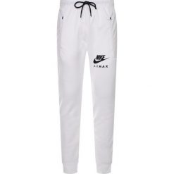 Spodnie dresowe NIKE Air Max Track CT9739. Białe jeansy męskie Nike, xl, bez wzorów, z elastanu. Za 399,00 zł.