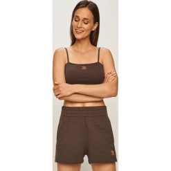 Adidas Originals - Top. Fioletowe topy damskie adidas Originals, z aplikacjami, z dzianiny, bez rękawów. Za 119,90 zł.