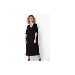 SUKIENKA OVERSIZE WYGODNA CZARNA. Czarne sukienki z falbanami marki Meleksima, l, z materiału, midi, oversize. Za 132,30 zł.